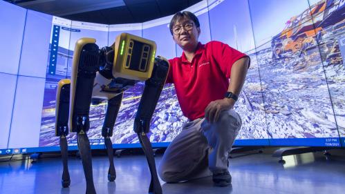 Robotic dog with researcher