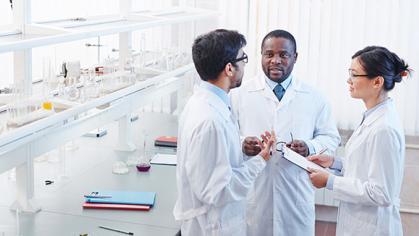 Three researchers in a lab