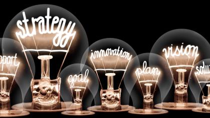 Light bulbs with strategy, vision, idea inside the bulbs