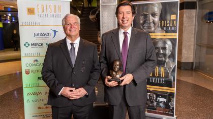 Photo of Drs. Dunn and Gatt holding Edison Patent Award