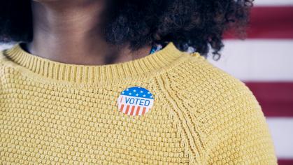 Black woman with I Voted sticker