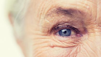 Close up of senior woman face and eye
