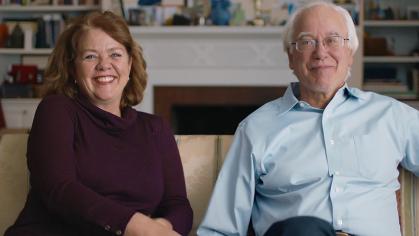 Martin Blaser and Gloria Dominguez-Bello sitting on a couch