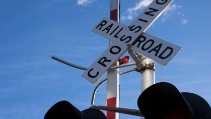 Railroad crossing sign and railroad traffic lights