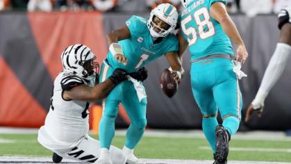 Miami Dolphins playing the Cincinatti Bengals in football. 
