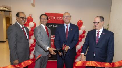 Jeetendra Eswaraka, Prabhas Moghe, President Jonathan Holloway, and Mike Zwick cutting the ribbon for the new Research Tower Core Services