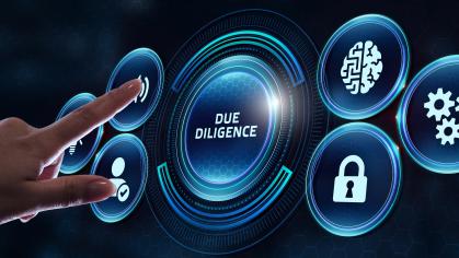 A person pressing a button with the words "due diligence." 