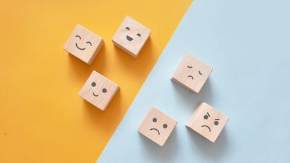Image of different emotions on wooden cubes
