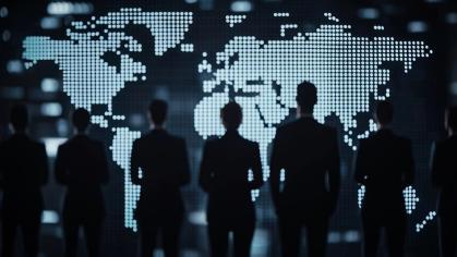 Leaders silhouetted against a digital world map backdrop