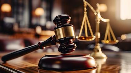 Scales of Justice and Gavel on a desk