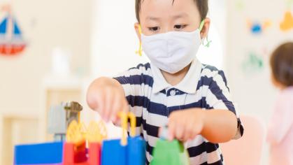 Pre-K student with mask