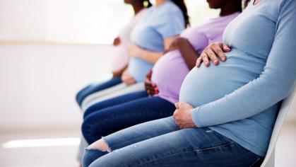 Four Pregnant Women Sitting