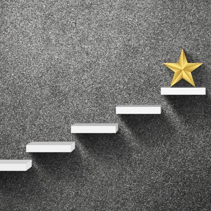 stylistic photo of a star on a step ladder representing an award