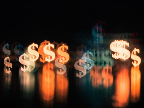 Dollar signs on black background