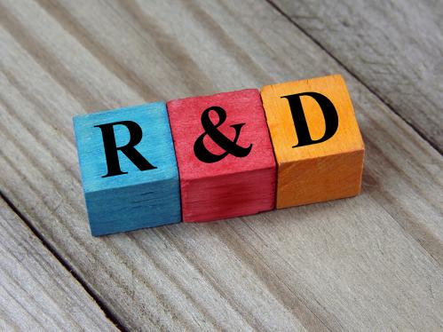 Image of three blocks spelling out R & D