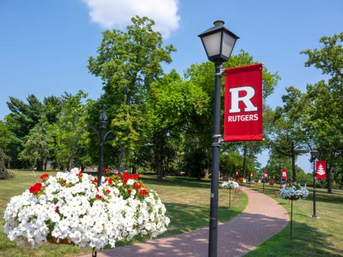 Rutgers Banner Outdoors on a Summer Day