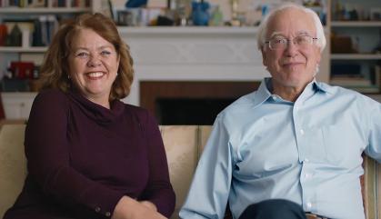 Martin Blaser and Gloria Dominguez-Bello sitting on a couch