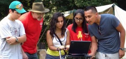 image of students with computer