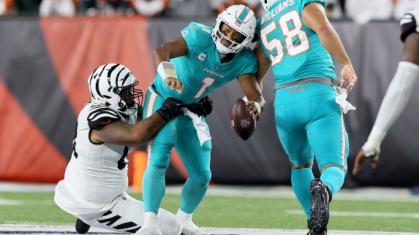 Miami Dolphins playing the Cincinatti Bengals in football.