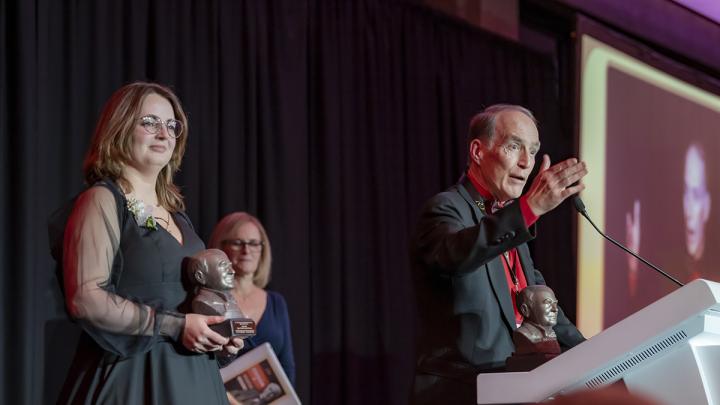 Karin Calvinho and Charles Dismukes accepting their 2024 Edison Patent Award