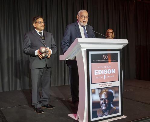 Alok Choudhary and Abraham Pinter accepting their 2024 Edison Patent Award