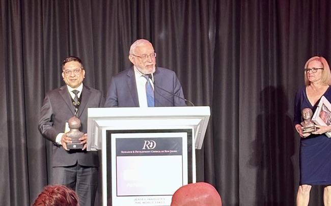 Abraham Pinter (center) and Alok Choudary (left) receiving their Edison Patent Award