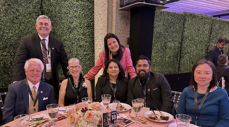 Rutgers Office for Research staff and research sponsors at a table at the Edison Patent Awards
