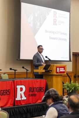 Rutgers-Camden Chancellor Antonio Tillis speaking to Camden researchers