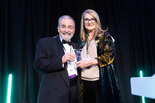 2025 Edison Patent Award honoree Brian Strom with Kathy Scotto on stage
