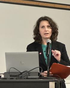 Marika Dunn speaking at the Fall Symposium