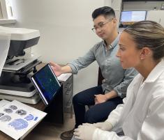 Image of Rutgers professor Justin Yao with a student in a lab